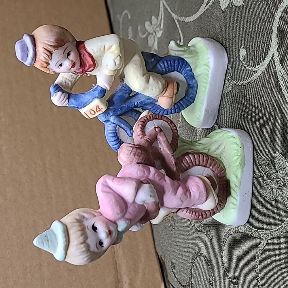 ceramic 104 boy & 103 girl bicycle clowns, 4.5" x 2.5"